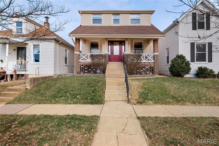 Property Photo:  4951 Blow Street  MO 63109 