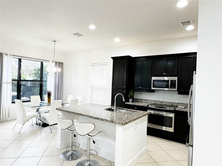 Property Photo:  3209 W 98th Pl  FL 33018 
