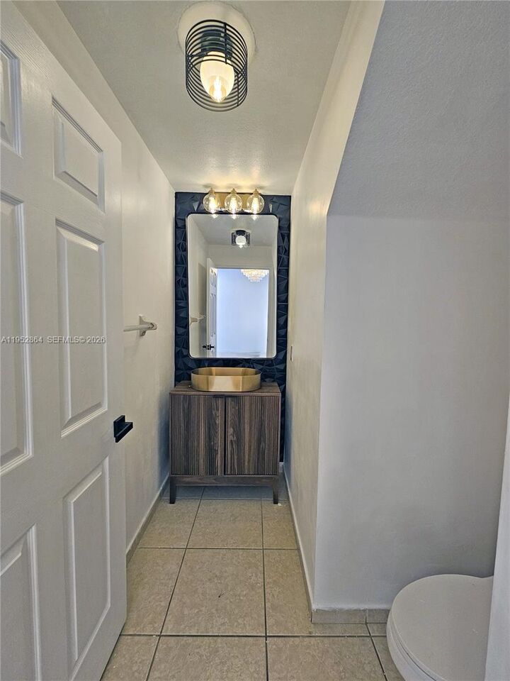 Property Photo:  8371 SW 124th Ave 105-12  FL 33183 