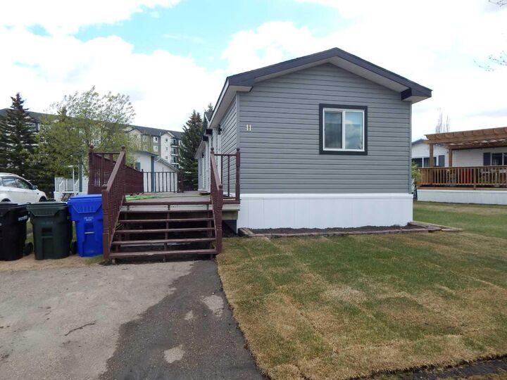 Property Photo: 5210 65 Avenue #11 AB T4H 1W7