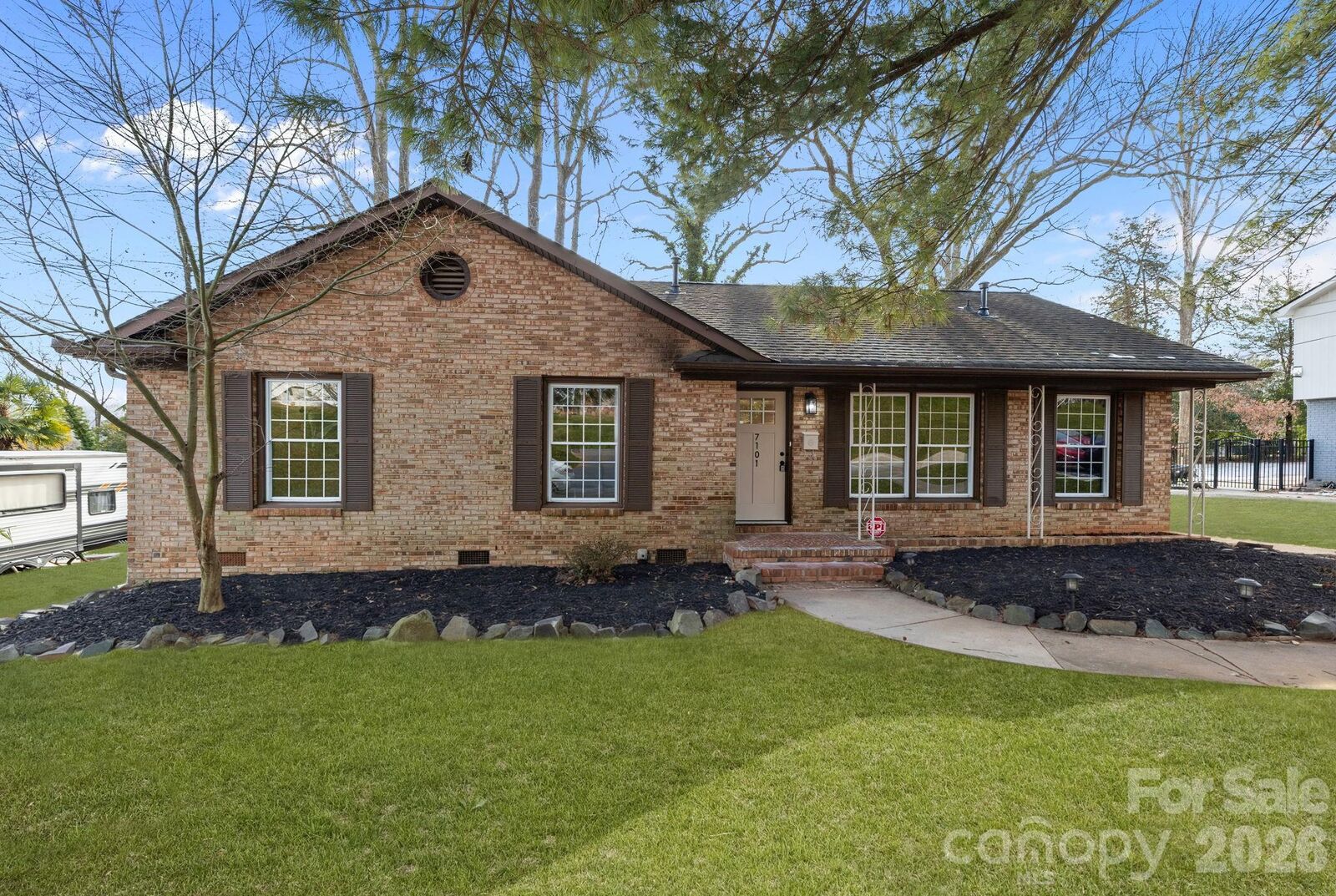 Property Photo:  7101 Woodstock Drive  NC 28210 