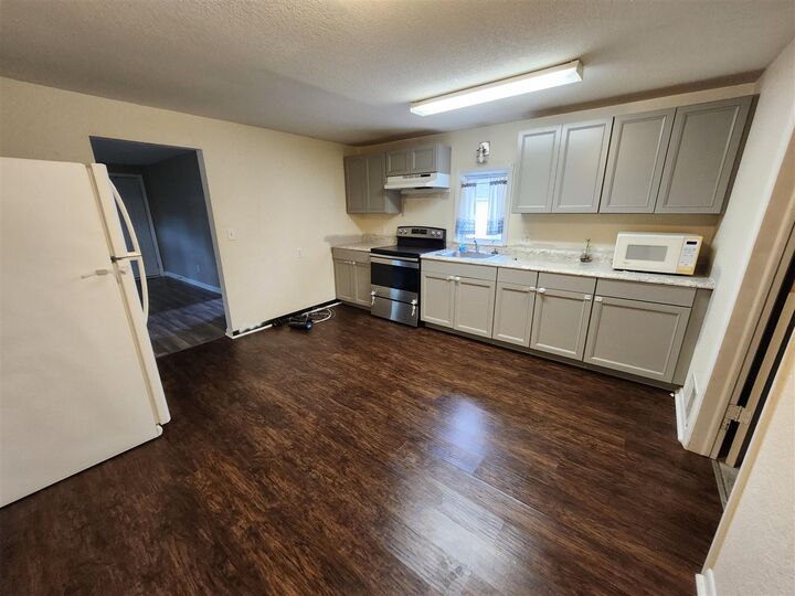 Property Photo:  138 E Sheridan Street  MI 49770-2962 