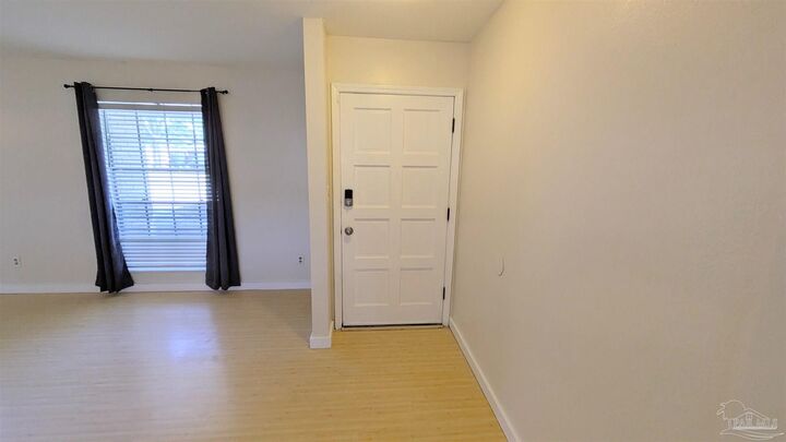 Property Photo:  8455 Lofton Dr  FL 32514 