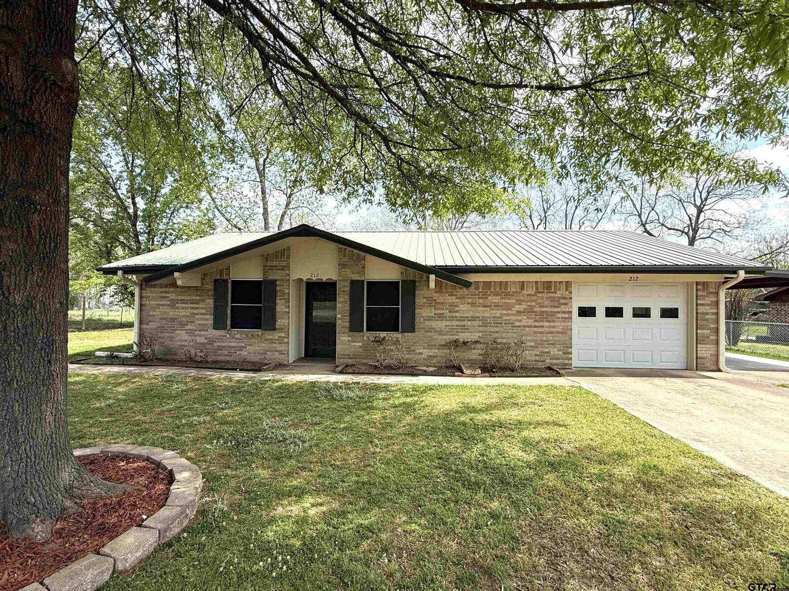 Property Photo: 212 College St TX 75477