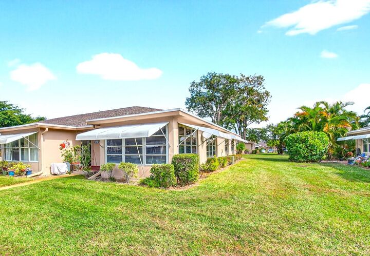 Property Photo:  1327 High Point Way SE D  FL 33445 