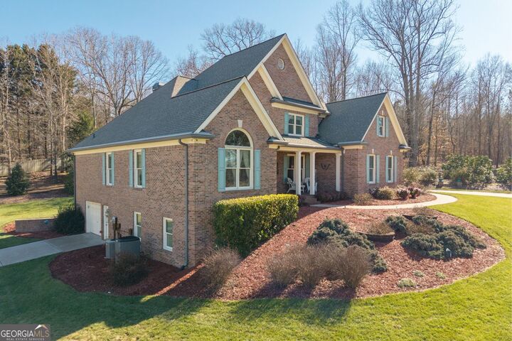 Property Photo:  8015 Hurakan Creek Crossing  GA 30028 