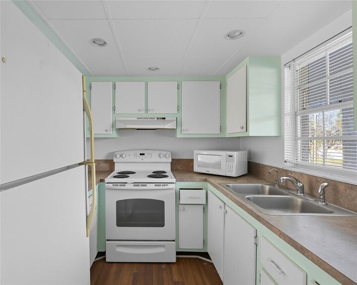 Property Photo:  4705 5th Street W 302  FL 34207 