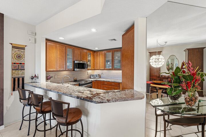 Property Photo:  12498 Crystal Pointe Drive 102  FL 33437 