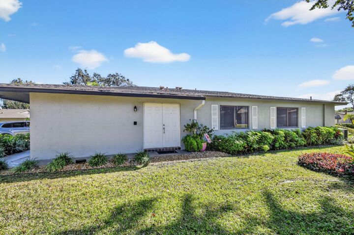 Property Photo: 1544 Palmland Drive FL 33436