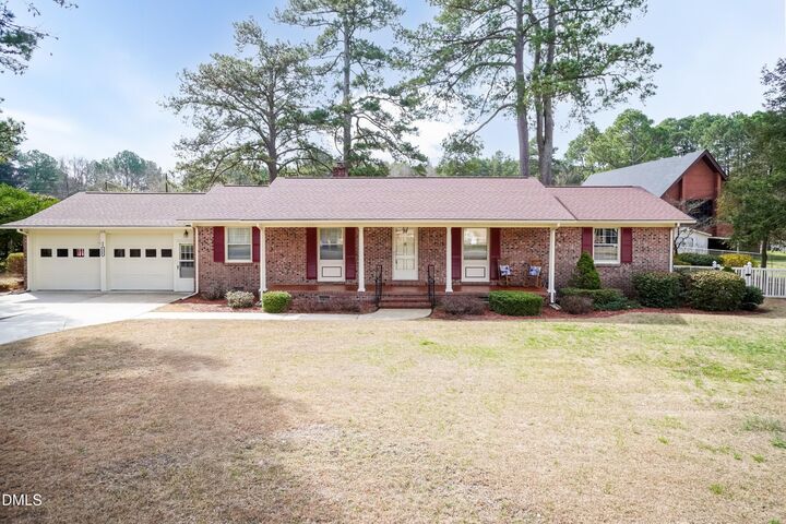 Property Photo:  115 Strickland Drive  NC 27577 