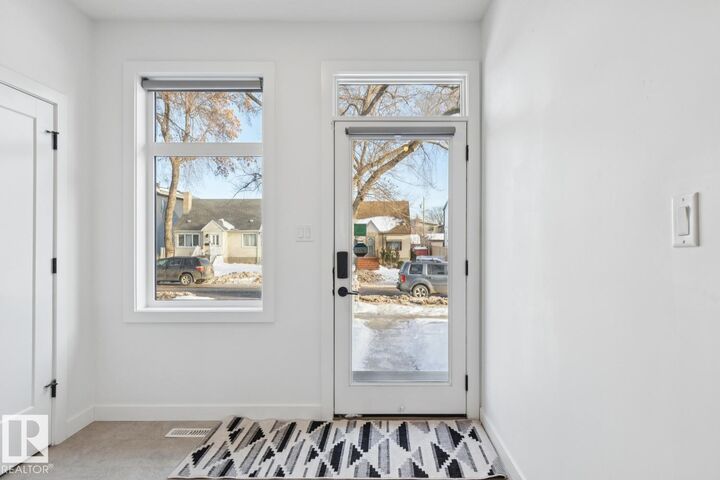 Property Photo: 11016 132 Street NW AB T5M 1E2