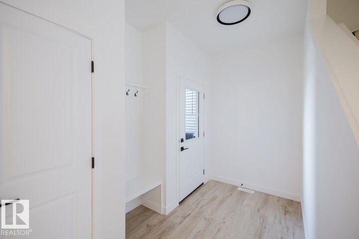 Property Photo: 2208 Crossbill Link NW AB T5S 0W3