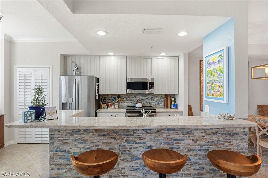 Property Photo: 9715 Acqua Court 113 FL 34113
