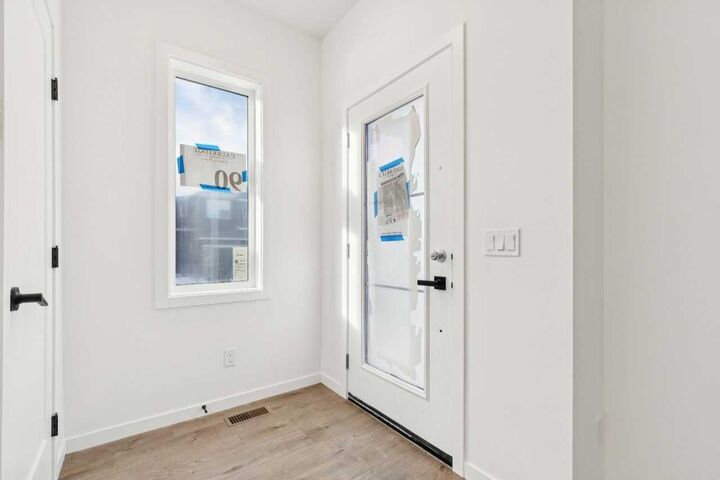 Property Photo:  90 Bluerock Hill SW  AB T2Y 0V6 