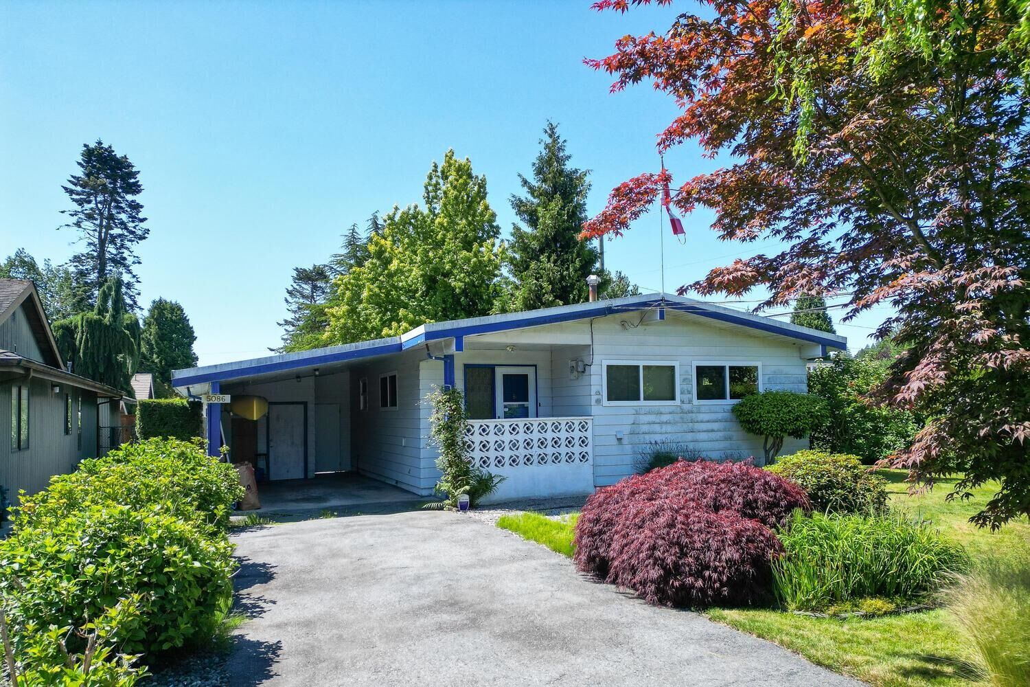 Property Photo: 5086 12 Avenue BC V4M 2A8