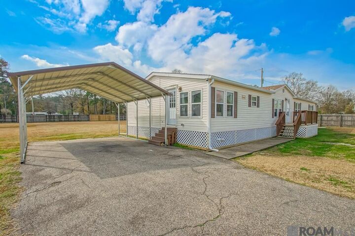 Property Photo:  9958 Little John Ave  LA 70706 