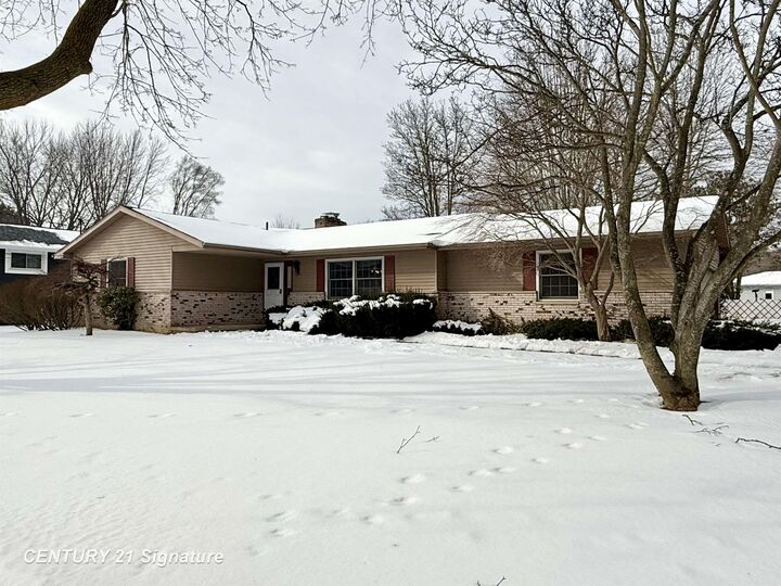 Property Photo:  1697 Thunderbird Drive  MI 48609 
