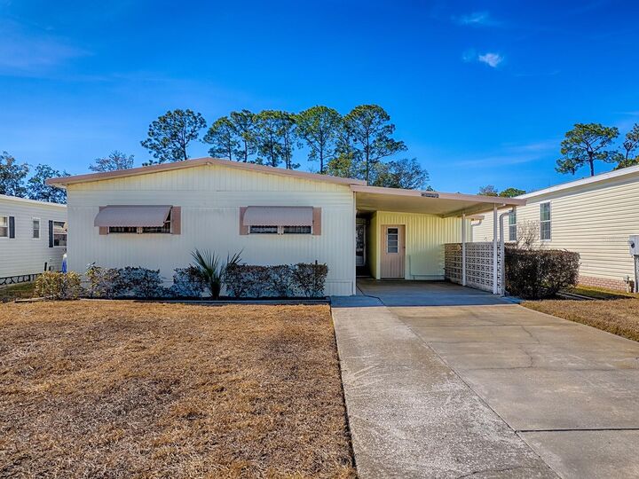 Property Photo:  25919 Zinnia Lane  FL 34705 