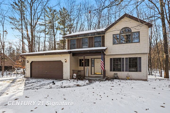 Property Photo:  909 S Pinecroft Street  MI 48640 