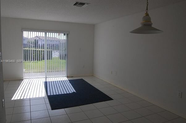 Property Photo: 14057 SW 121st Pl 7-24 FL 33186