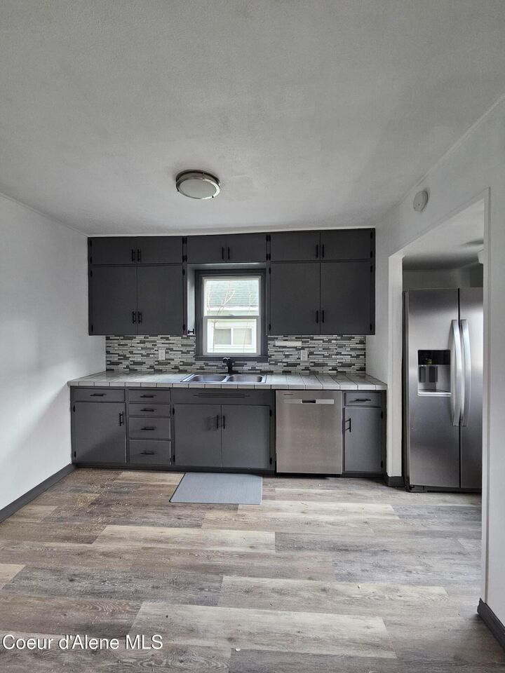 Property Photo:  303 W Mission Ave  ID 83837 