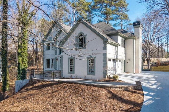 Property Photo:  9570 Huntcliff Trace  GA 30350 