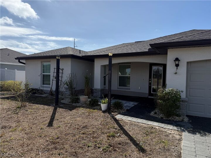 Property Photo: 910 NW 8th Terrace FL 33993