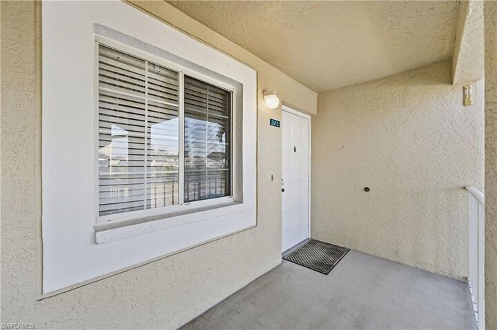 Property Photo:  7760 Emerald Cir S202  FL 34109 