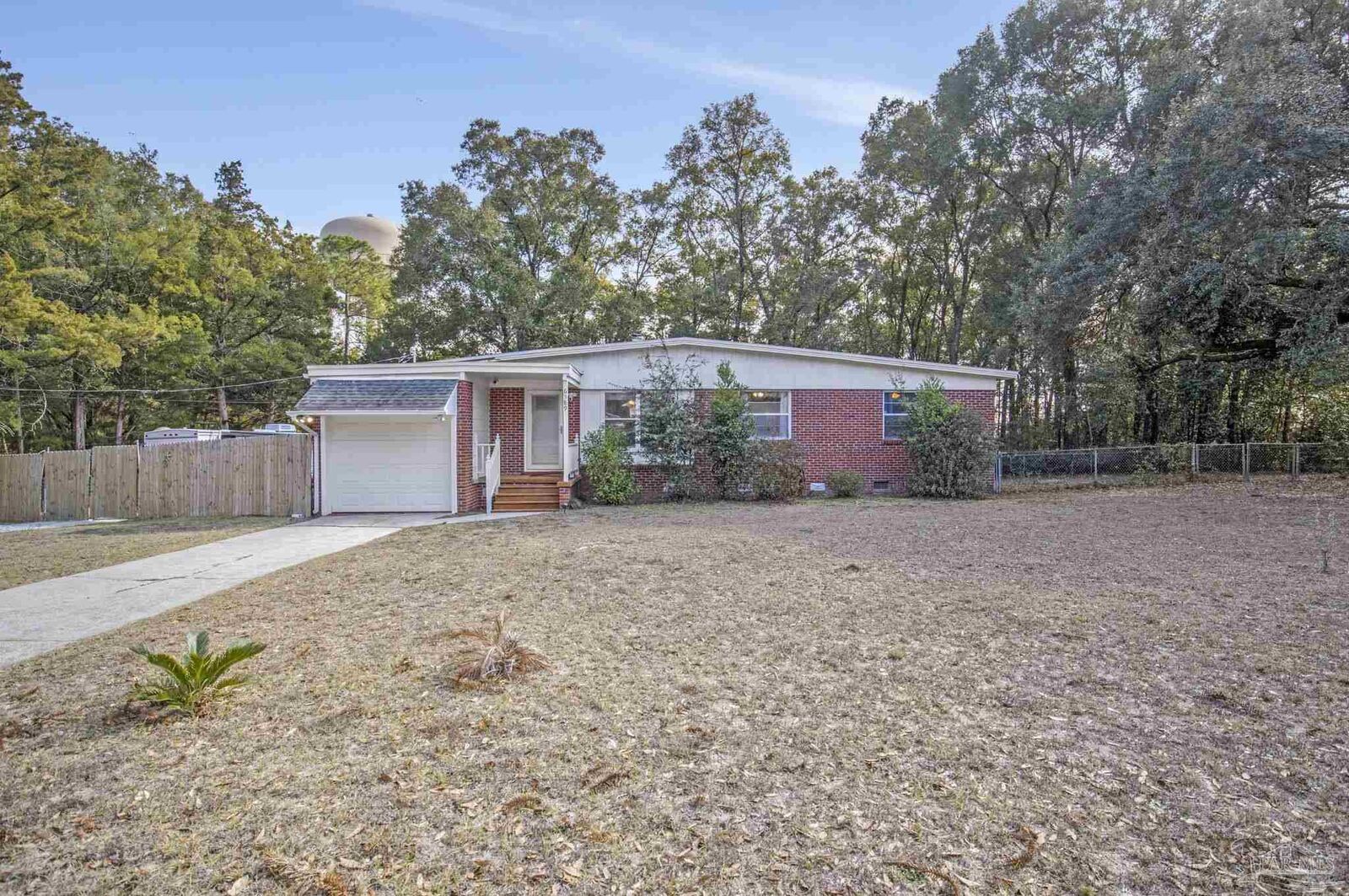 Property Photo:  6589 Cedar St  FL 32570 