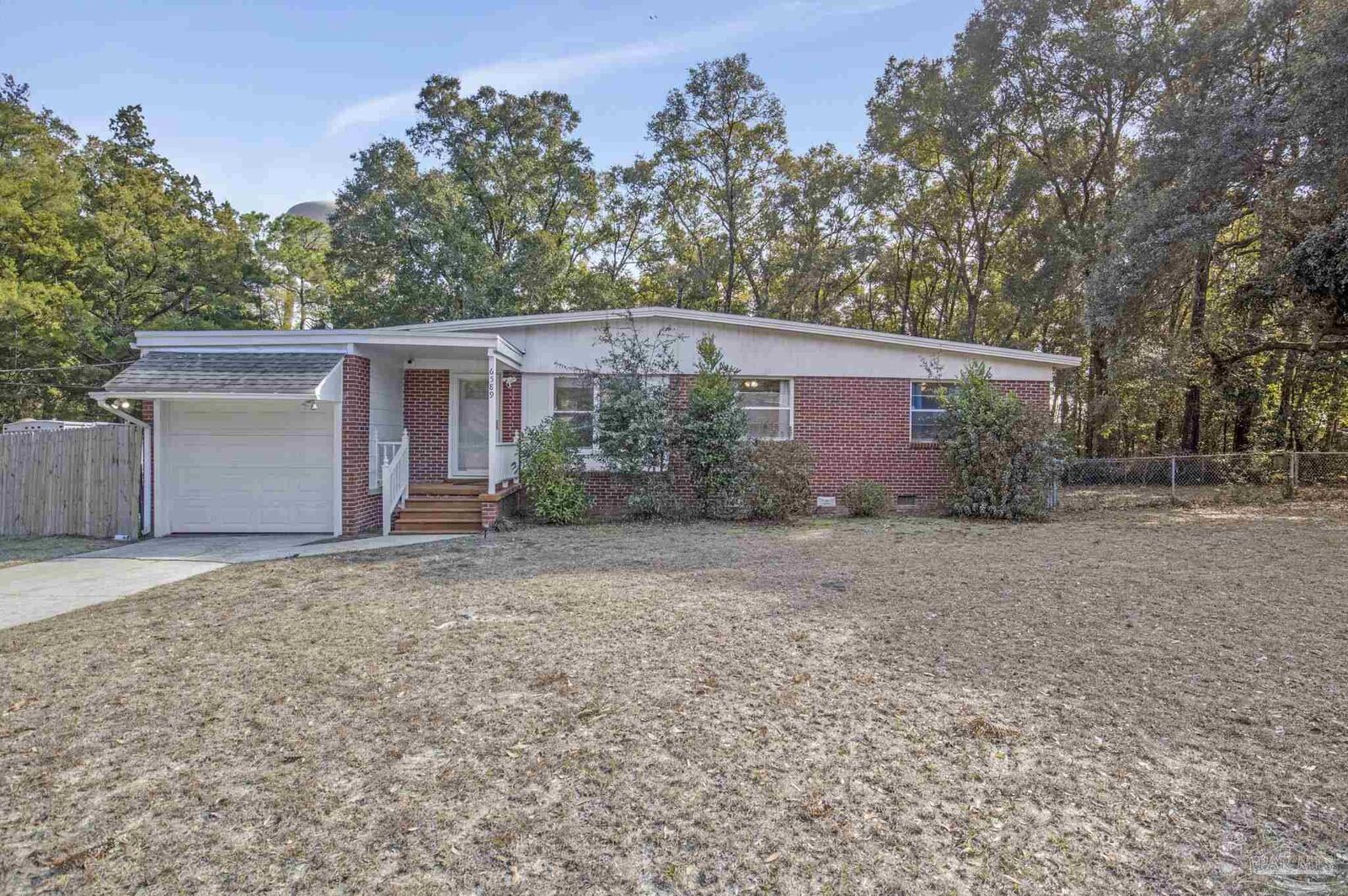 Property Photo:  6589 Cedar St  FL 32570 