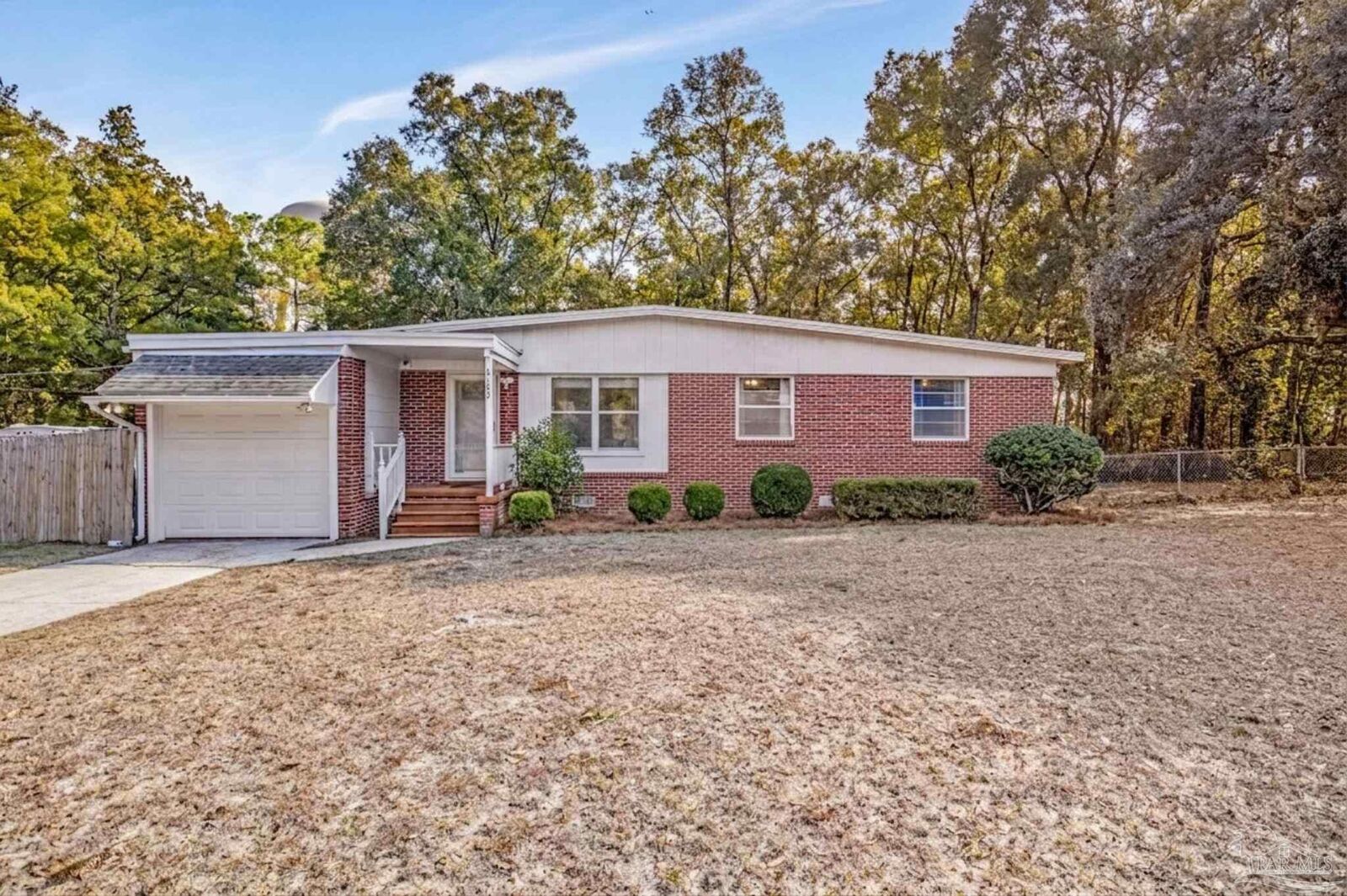 Property Photo:  6589 Cedar St  FL 32570 