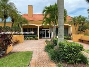 Property Photo:  18017 NW 68th Ave A-101  FL 33015 