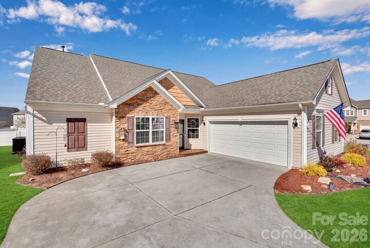 Property Photo:  4444 Bravery Place SW 116  NC 28027 