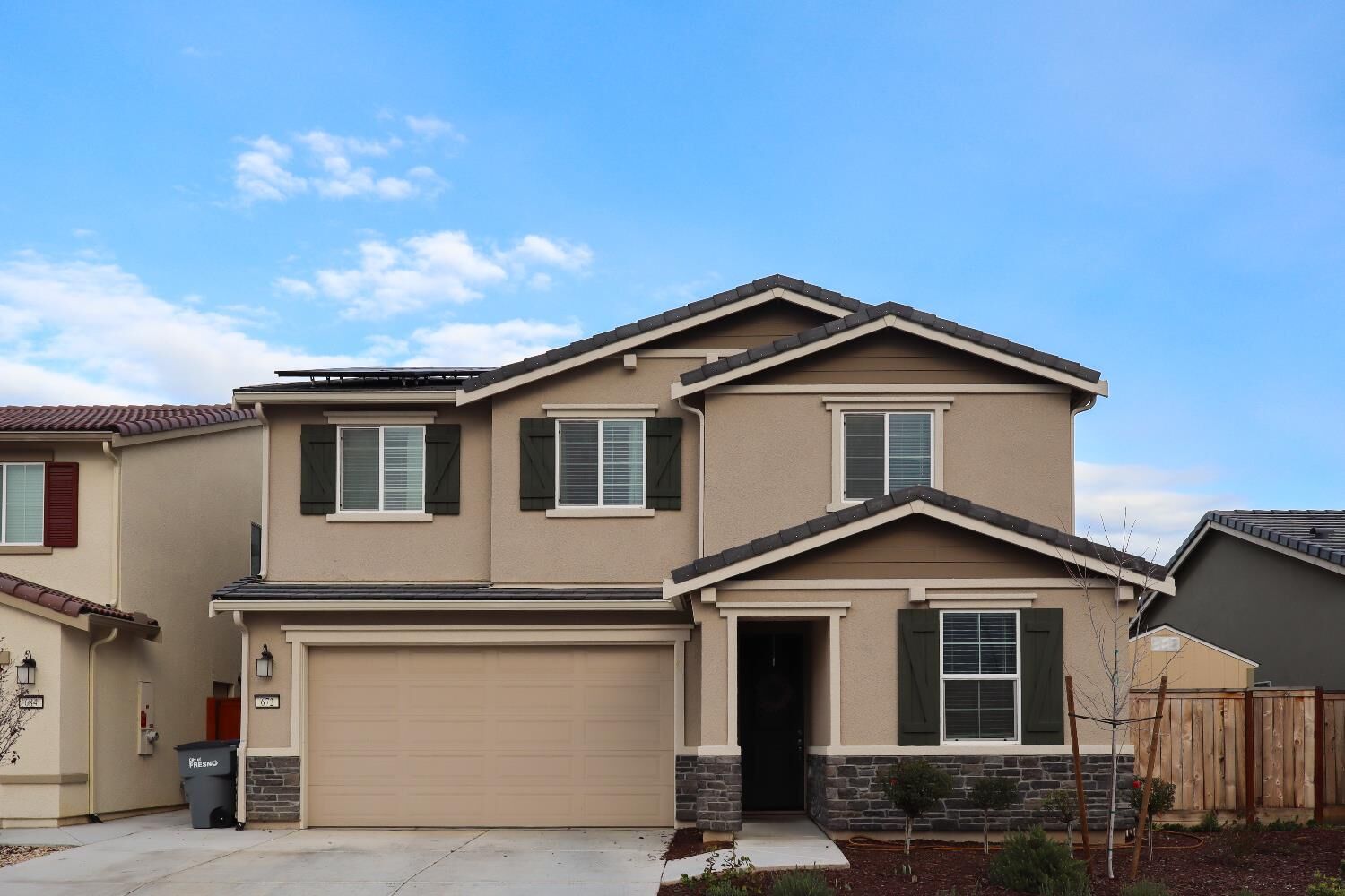 Property Photo:  672 N Apricot  CA 93727 