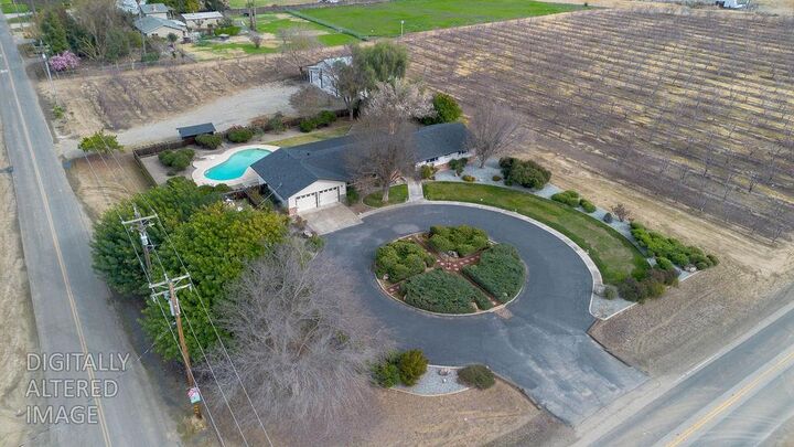 Property Photo:  16012 Sycamore Avenue  CA 95363 