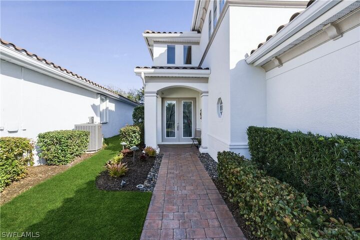 Property Photo:  5686 Lago Villaggio Way  FL 34104 