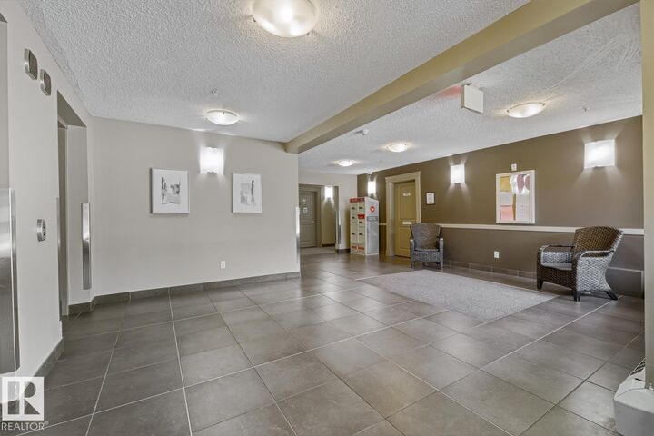 Property Photo:  13908 136 Street NW 414  AB T6V 1Y4 