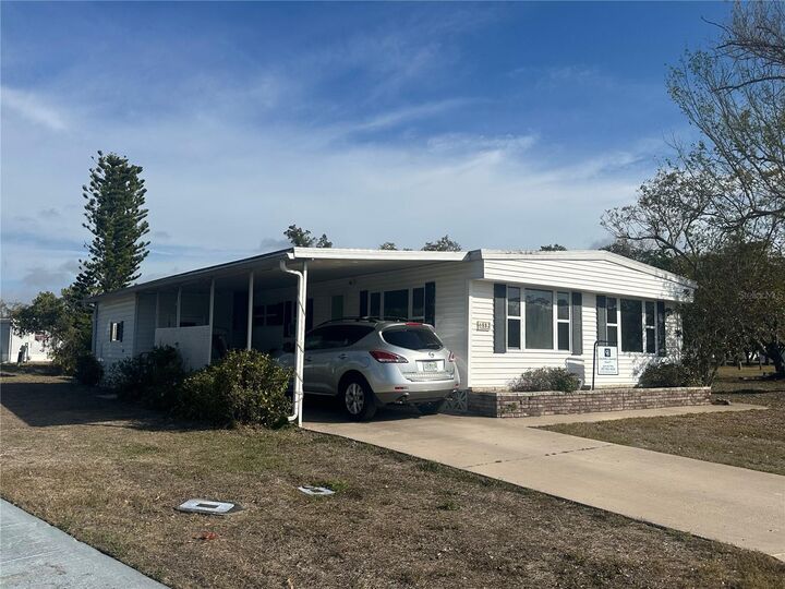 Property Photo:  6882 Holo Court  FL 34287 