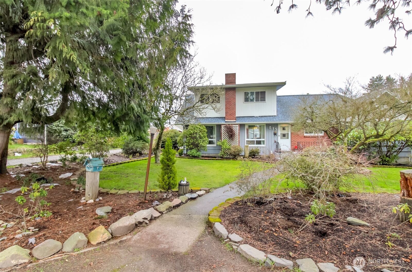 Property Photo:  215 E 48th Street  WA 98404 