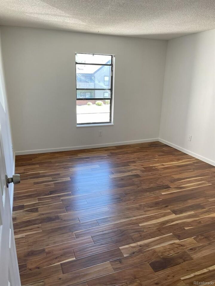 Property Photo:  11901 E Harvard Avenue 203  CO 80014 