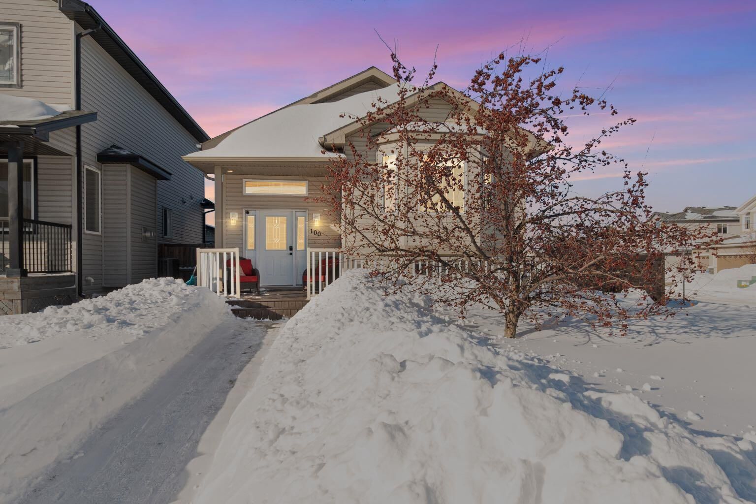 Property Photo: 100 Honeysuckle Way AB T9K 0M7