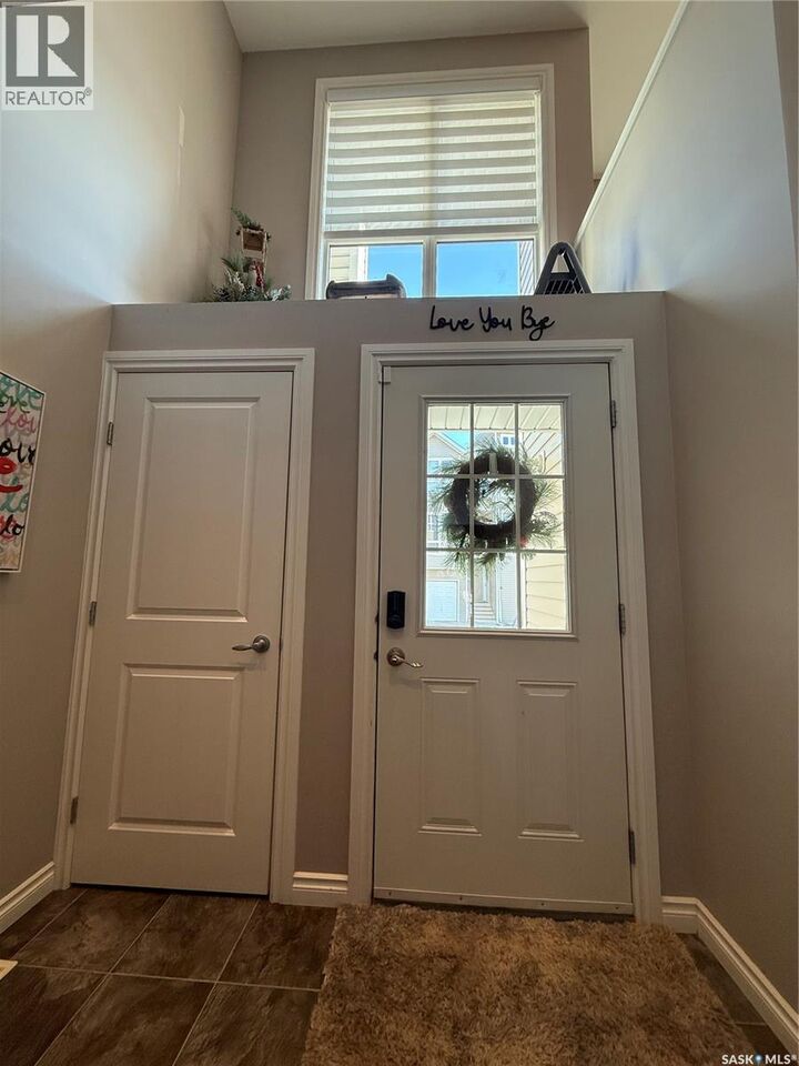 Property Photo:  2 697 Sun Valley Drive  SK S4A 2X7 