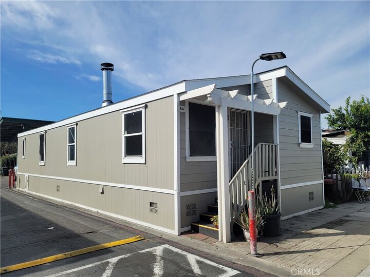 Property Photo:  12265 Woodruff Avenue 64  CA 90241 