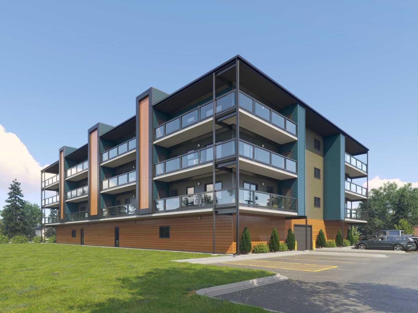 Property Photo: 97 Station Drive 201 AB T4S 0S6