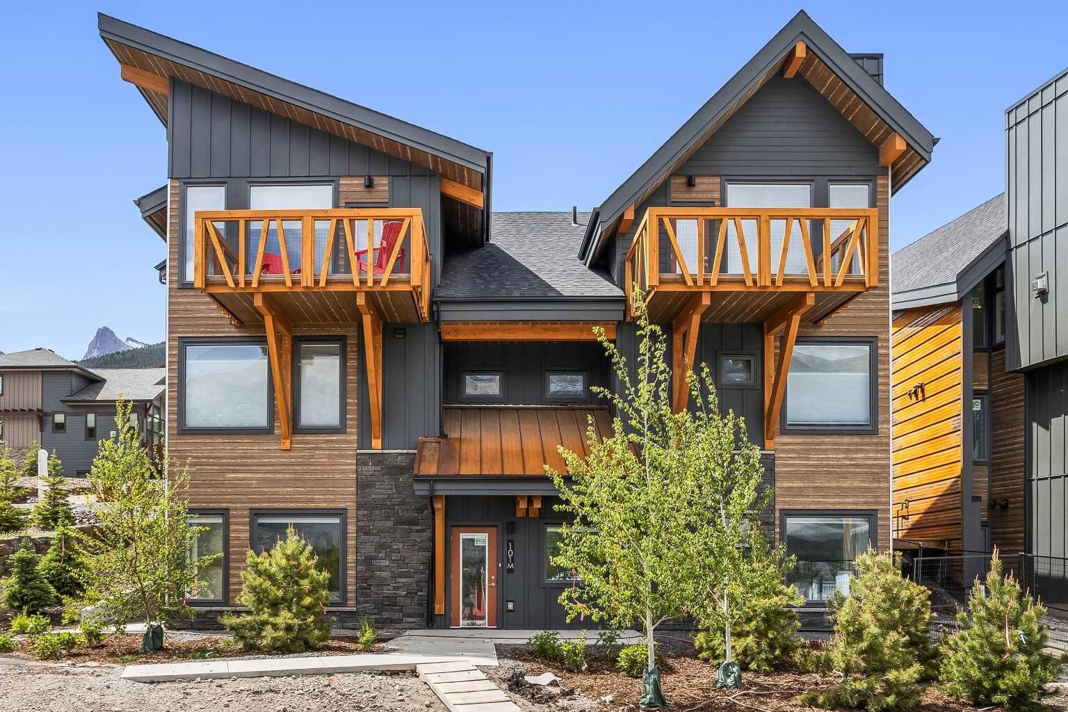 Property Photo:  209 Stewart Creek Rise 101K  AB T1W 0N9 