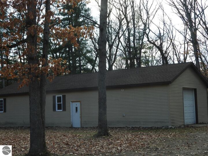 Property Photo:  7861 N Bass Lake Road  MI 49644 