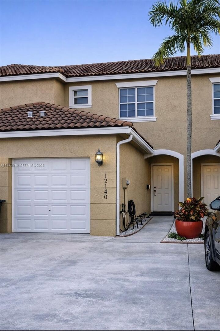 Property Photo:  12140 SW 4th St  FL 33025 