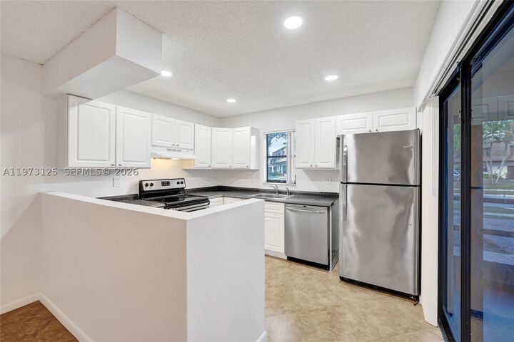 Property Photo:  9340 SW 61st Way B  FL 33428 