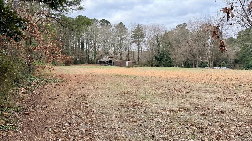 Property Photo:  1400 Woodstock Road  GA 30075 