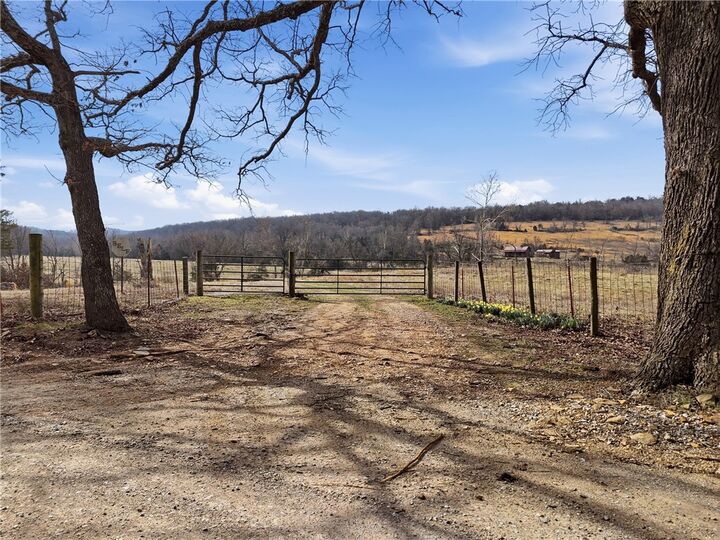 Property Photo:  1143 Madison 7615  AR 72740 